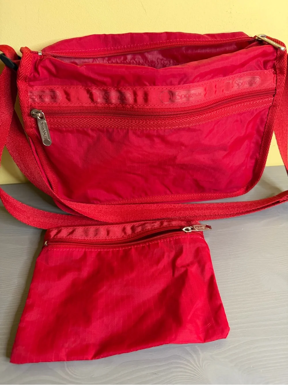 LeSportsac Compact Red Crossbody Bag with and matching coin purse